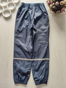 12 років, зріст 152 Штани на кшталт вітровки зі світловідбивачами