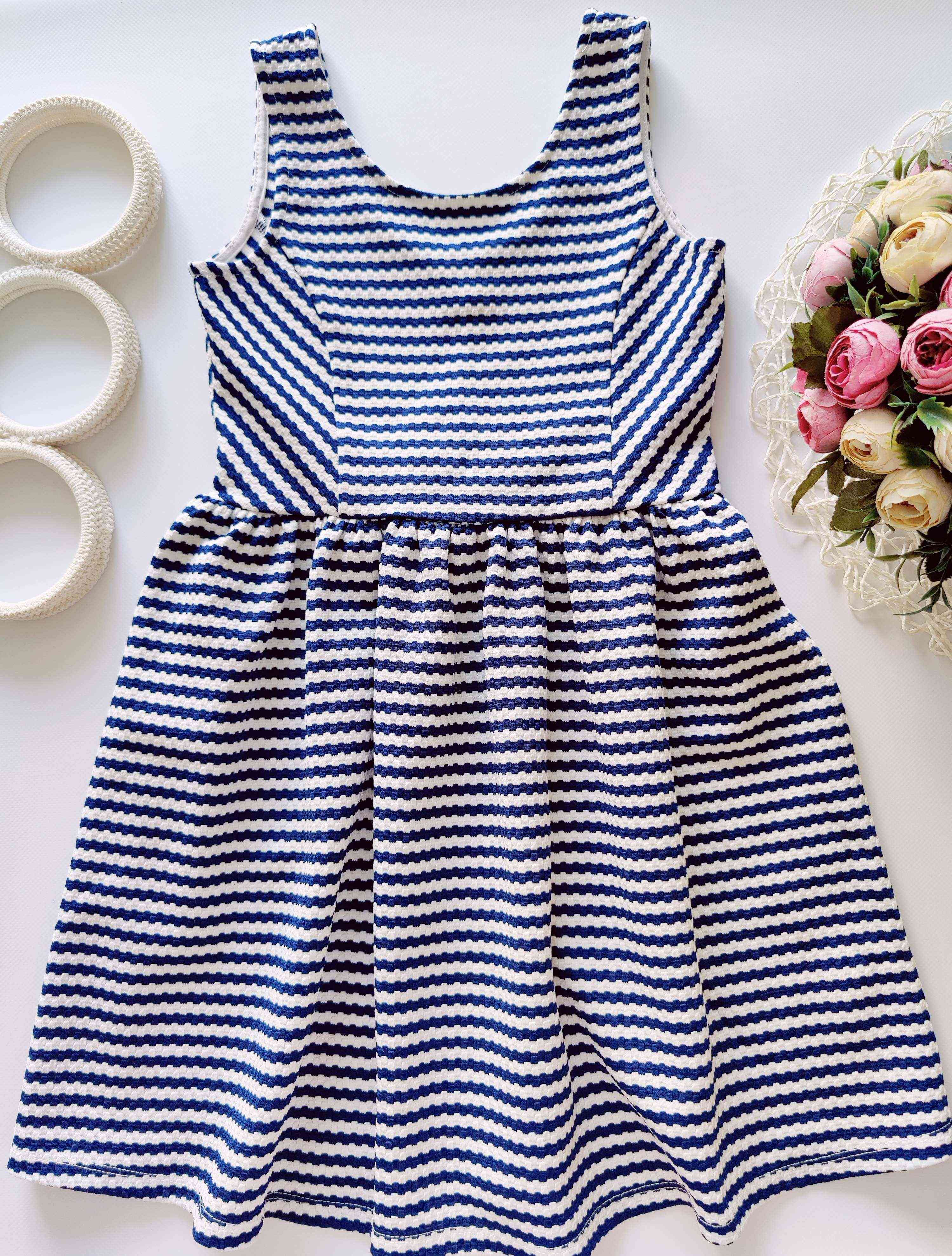 8,9 років, зріст 128,134 Плаття в рубчик