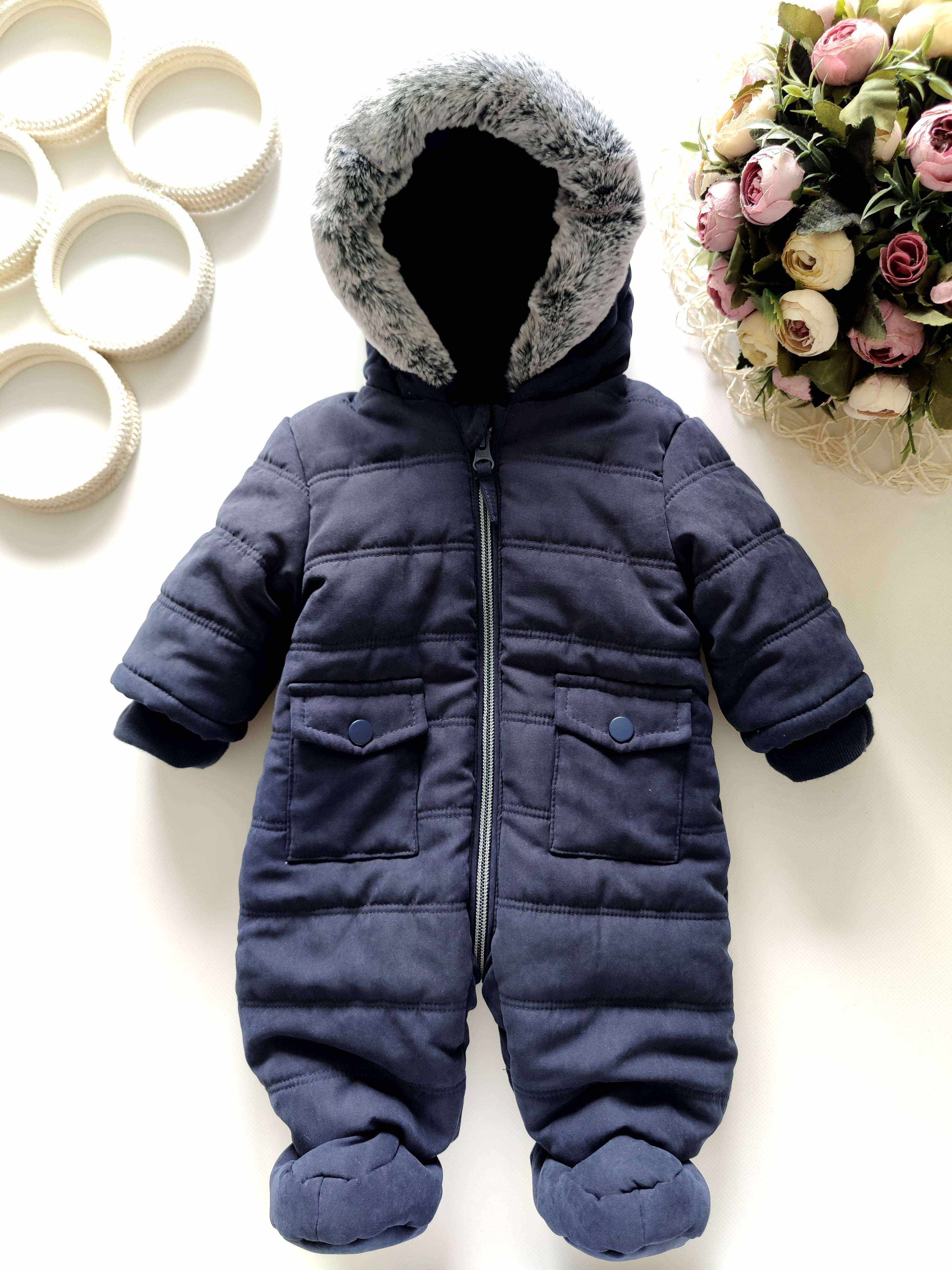 Теплый комбинезон для новорожденного