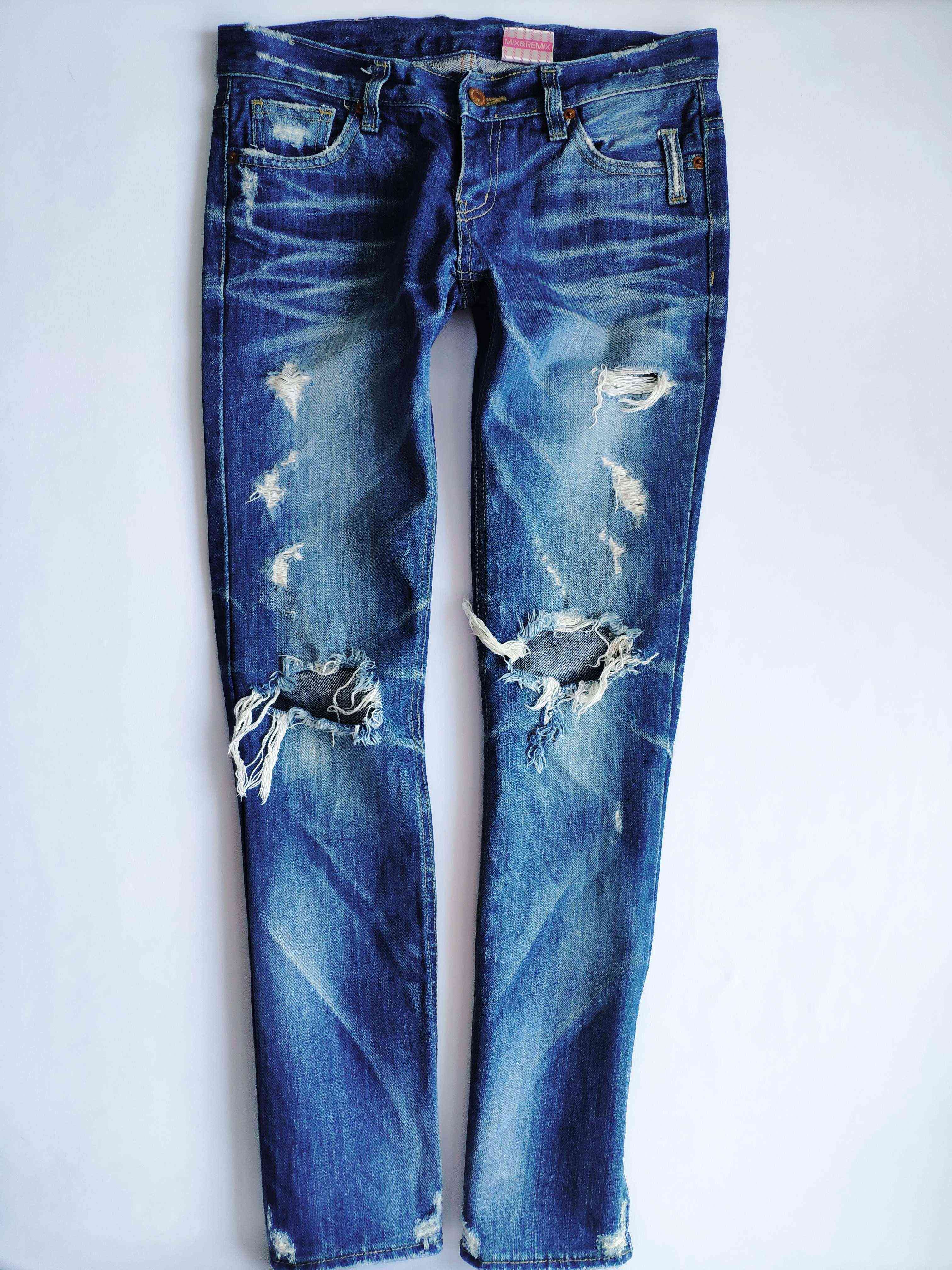 S-ка Стильные рваные женские джнсы