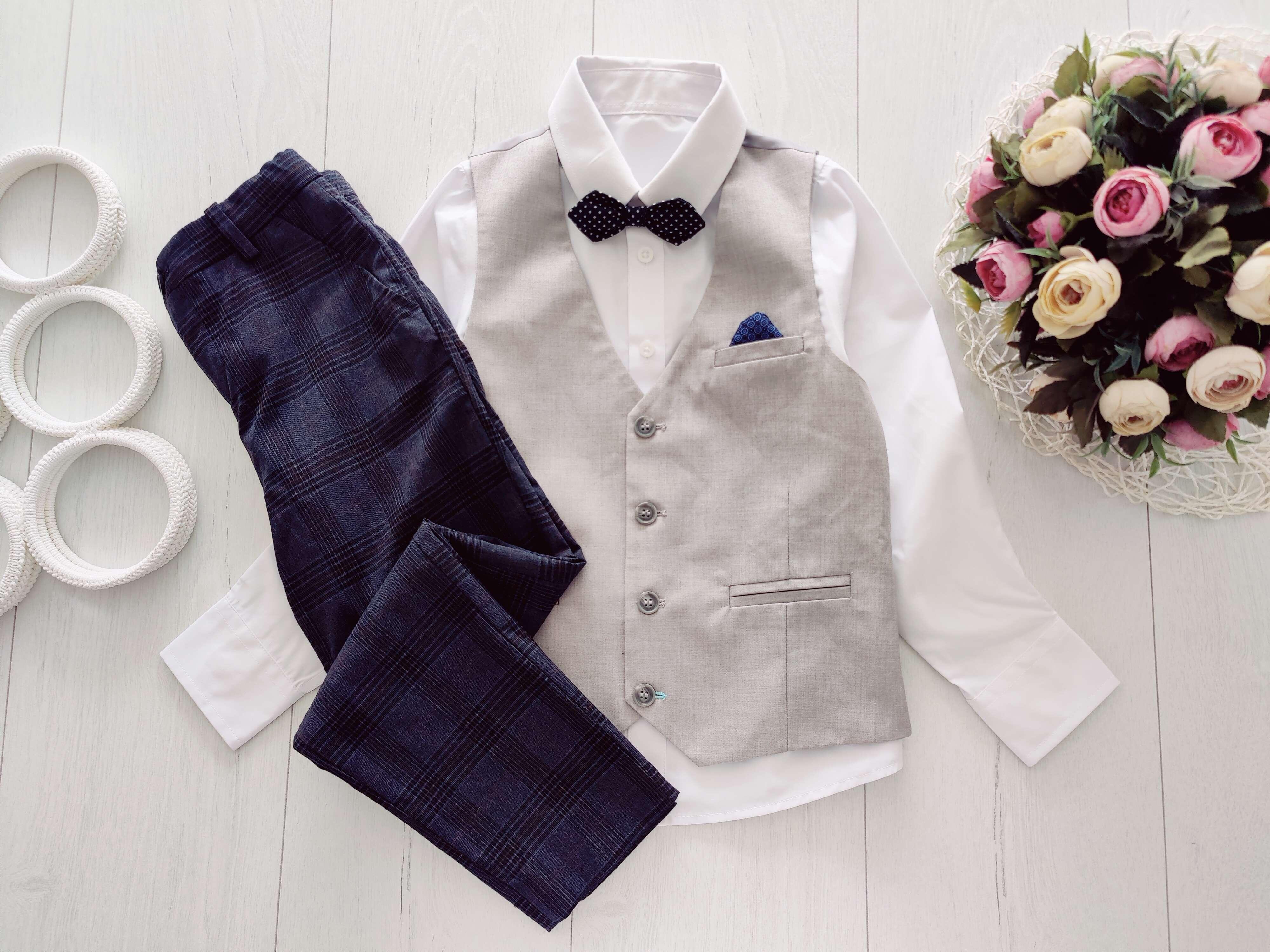 6,7 років, зріст 122 Жилетка штани і нова сорочка