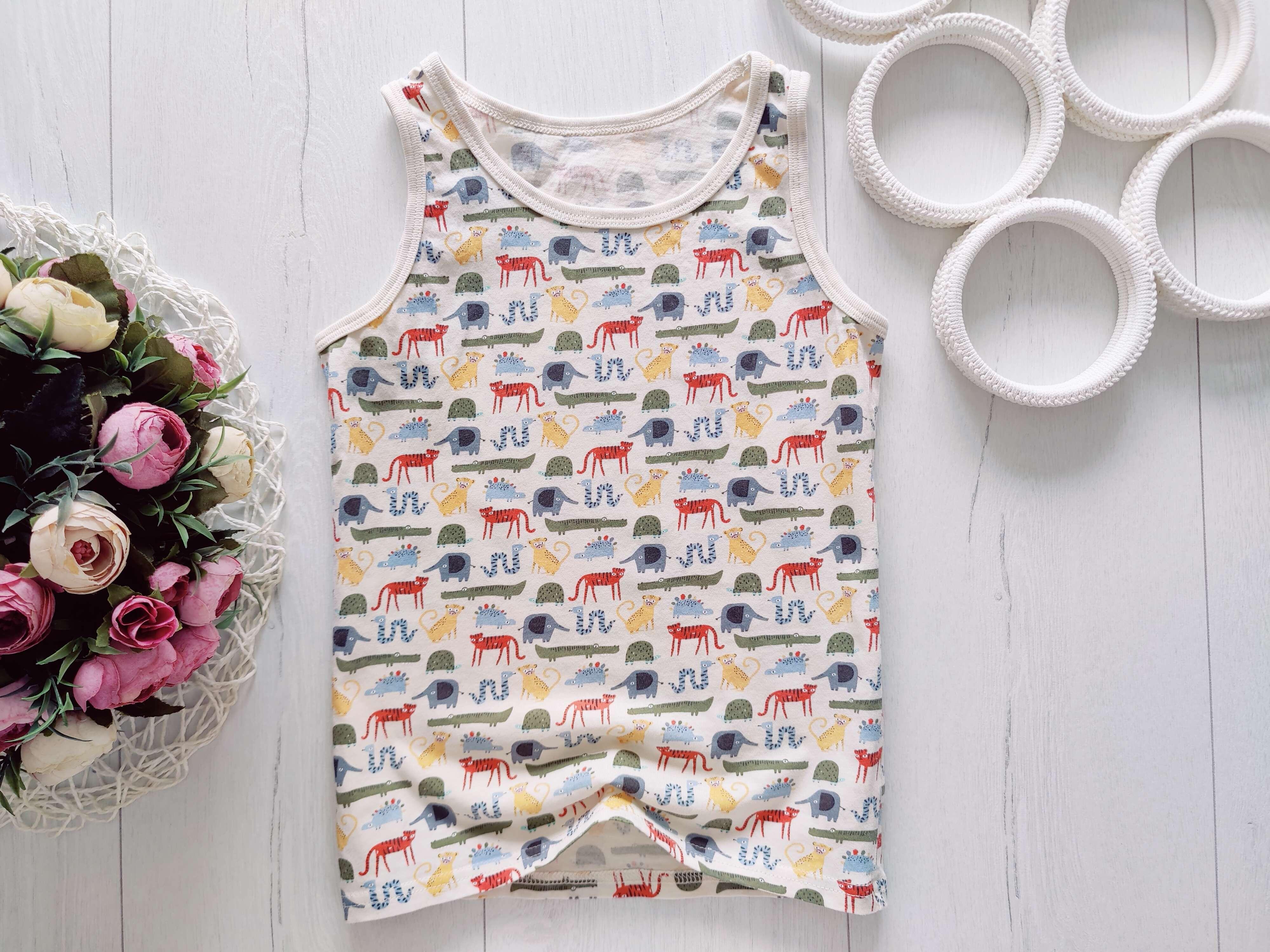 8,9 років, зріст 128,134 Бежева майка в тваринах