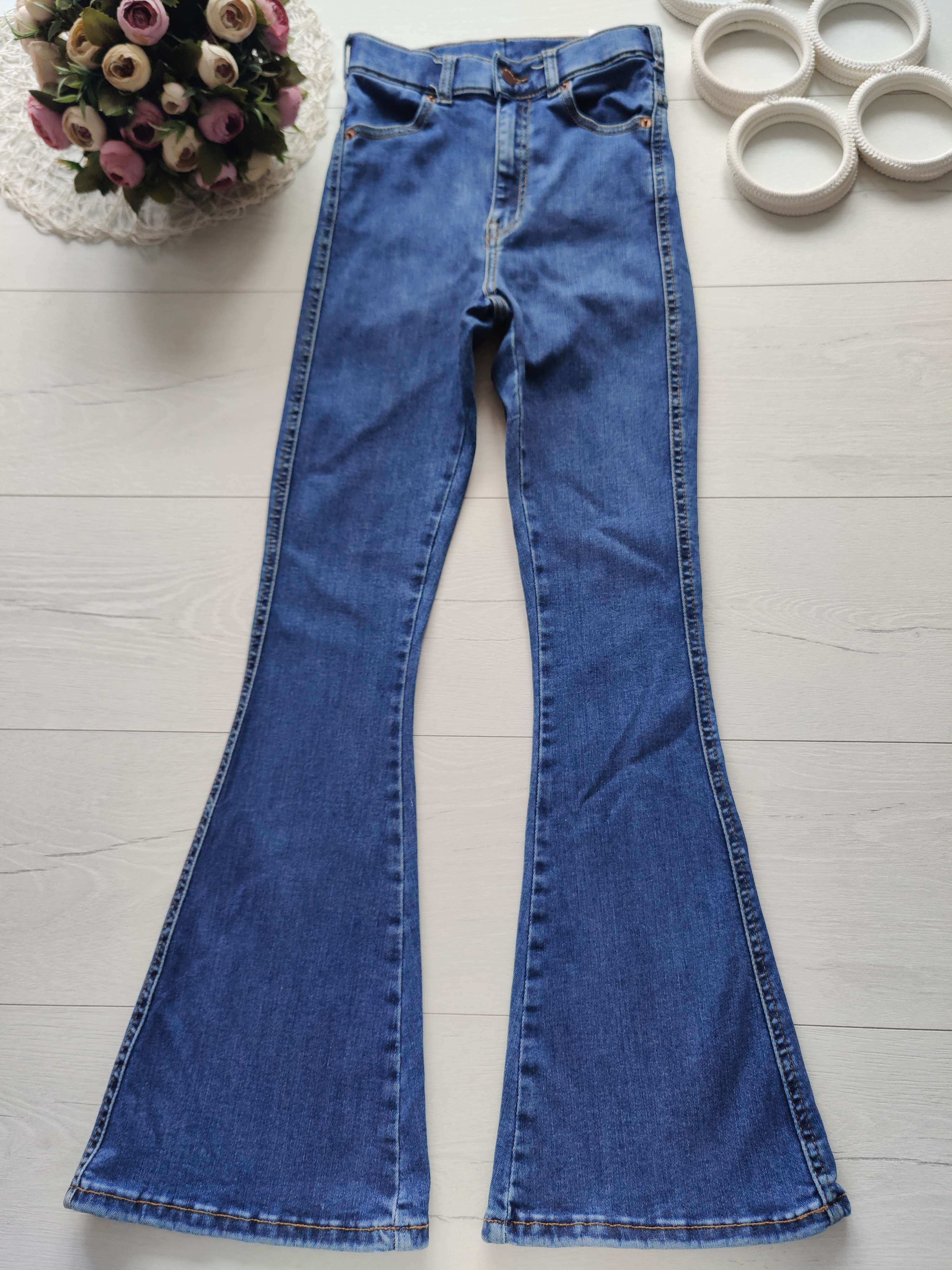 S Стретчові джинси кльош