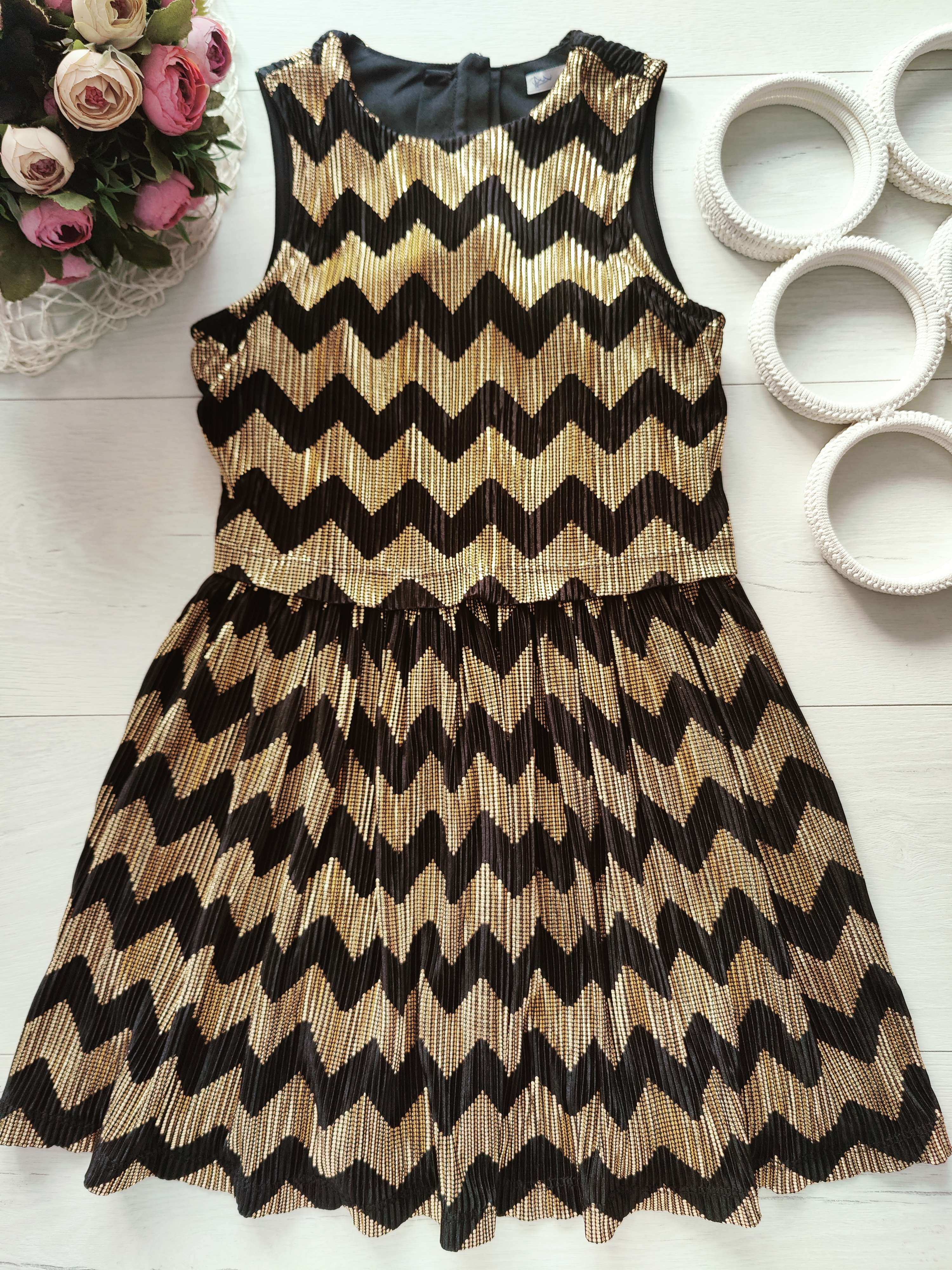 7,8 лет, рост 128 Красивое нарядное золотистое детское платье