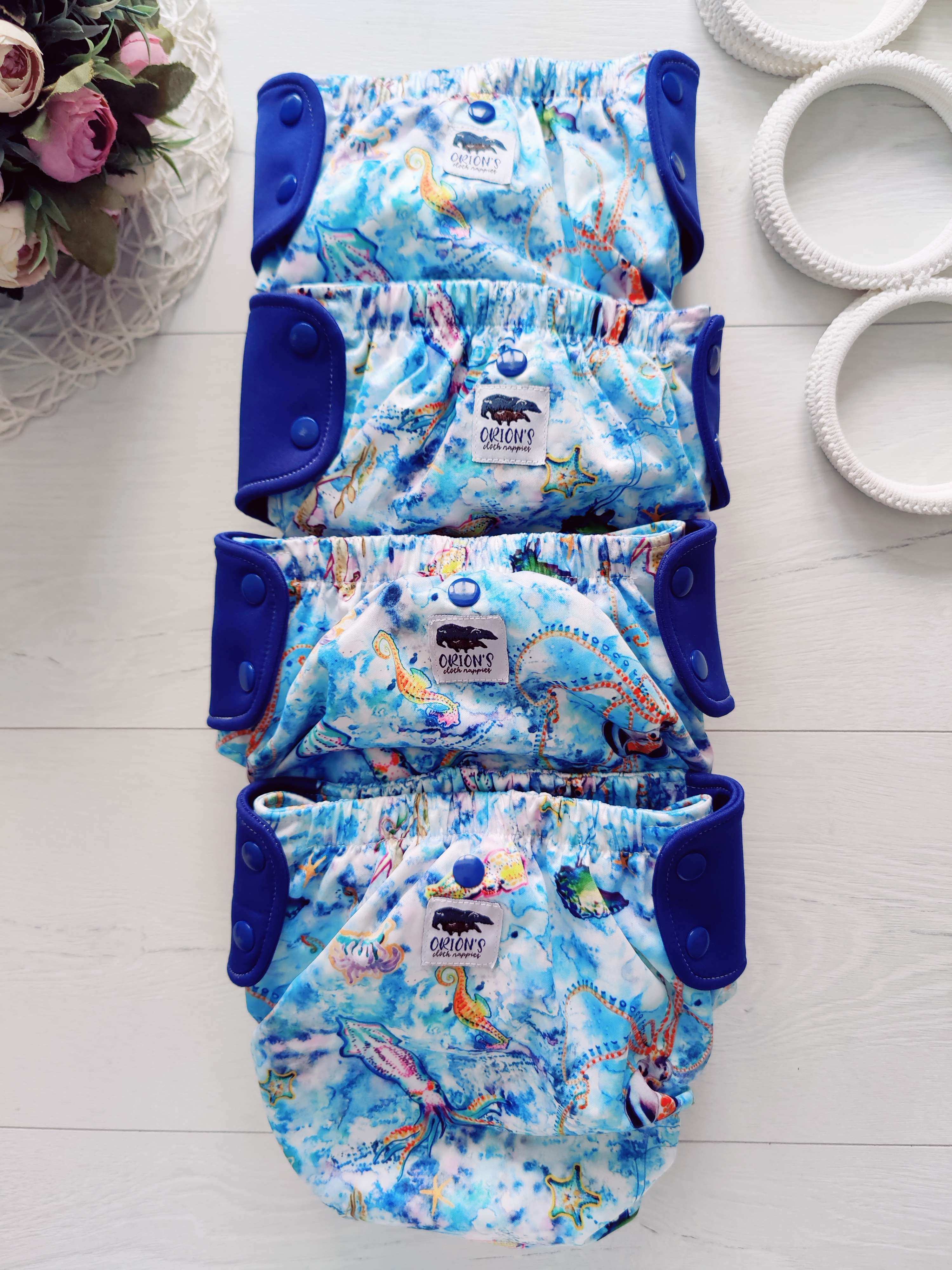 Універсальний багаторазовий памперс