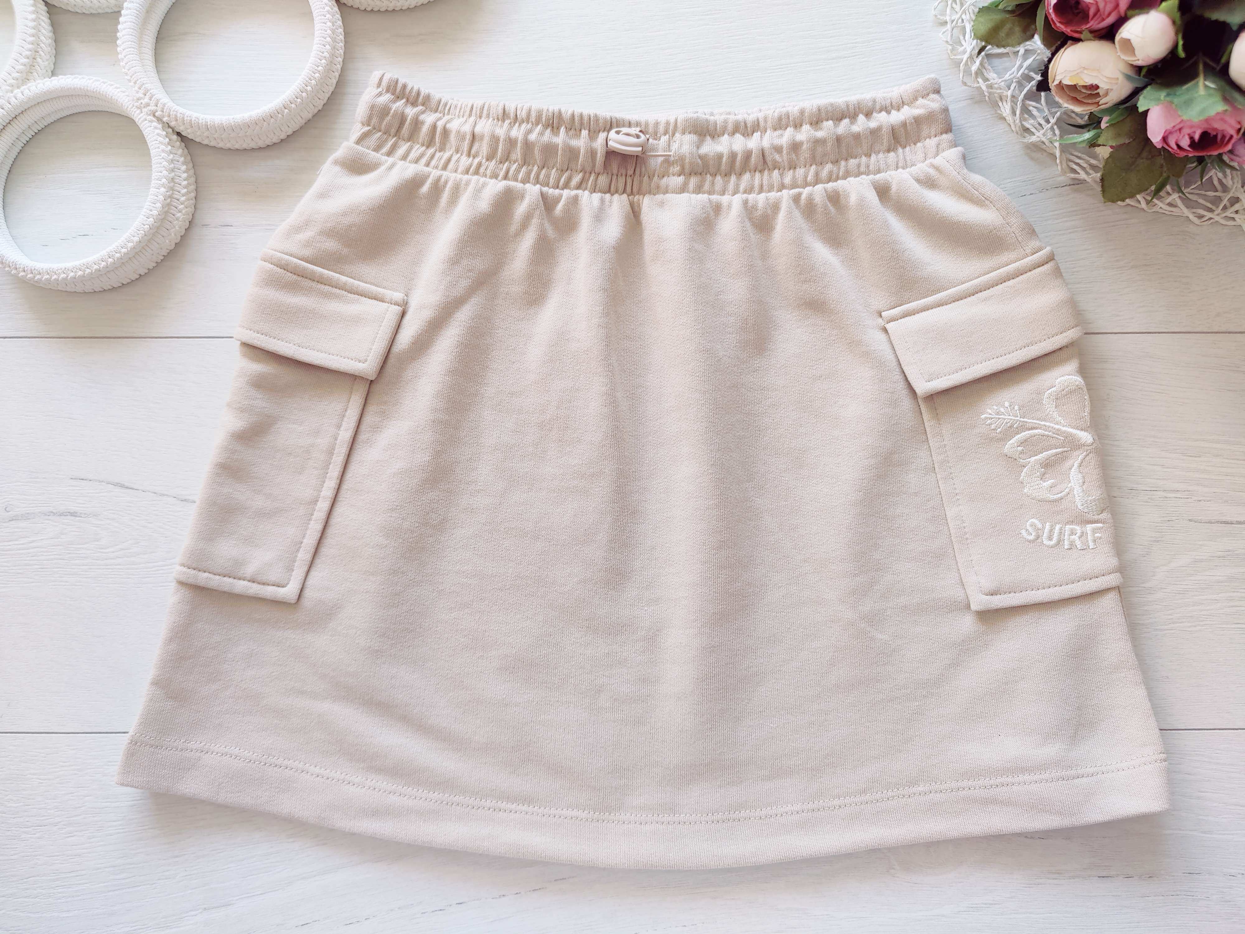 11 лет, рост 146 Трикотажная юбка с накладными карманами детская