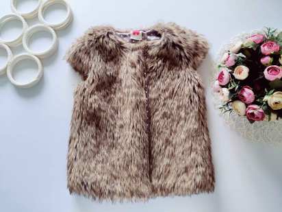 9 років, зріст 134 Хутряний дитячий жилет