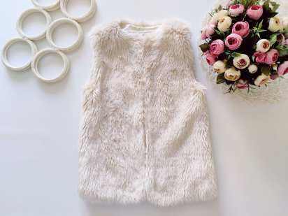 8,9 років, зріст 134 Хутряний дитячий жилет