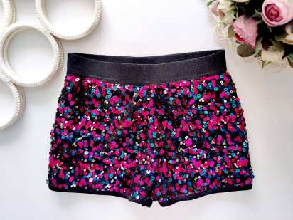 9 років, зріст 134 Ошатні блискучі шорти в паєтках