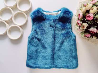 8 лет, рост 128 Красивая меховая жилетка