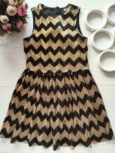 7,8 лет, рост 128 Красивое нарядное золотистое детское платье